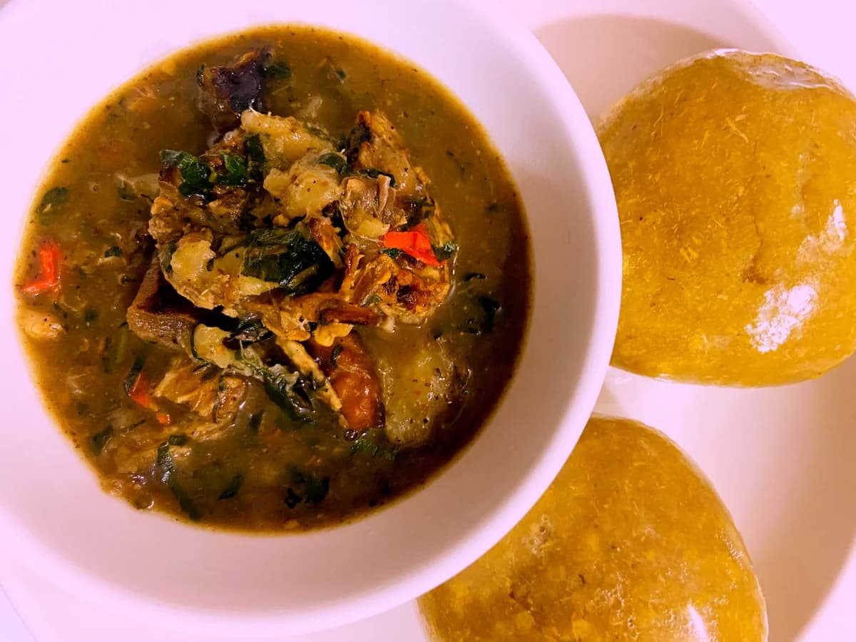 Eba with White soup (Ofe Nsala)